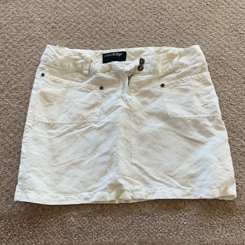 White skirt.